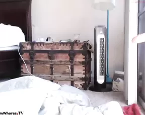 Busty mistress gives handjob wearing gloves
