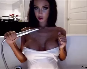 Sex bomb slim brunette with big tits teasing webcam show