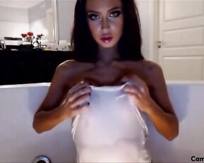 Sex bomb slim brunette with big tits teasing webcam show