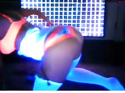 A black haired slut gets naked while chatting with friends