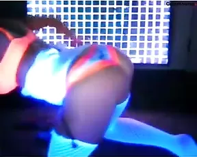 A black haired slut gets naked while chatting with friends