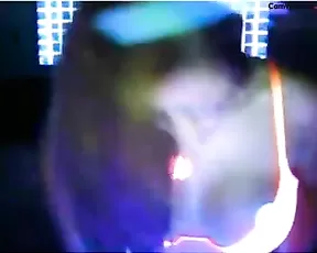 A black haired slut gets naked while chatting with friends