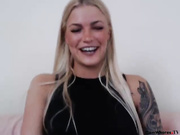 Two girls are using a dildo