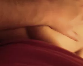 Big breasted babe inserts stuff in her ass