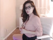Beauty teen in glasses dancing webcam show