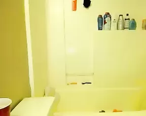 Tinyprincess18 slim blonde plays with giant dildo in bath in webcam show