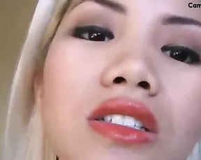 Georgeous Asian long tongue mouth show.
