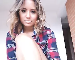 Busty woman strips naked and has fun