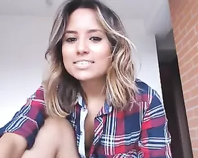 Busty woman strips naked and has fun
