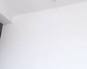 Busty woman strips naked and has fun