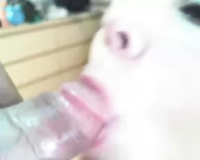 A dark haired babe uses a red dildo on her cunt
