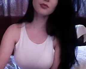 Cassie plays with a dildo