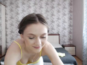 A pony tailed babe is getting recorded while sucking