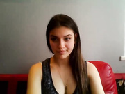 Dark haired Milf sucking on her toys