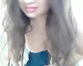 Black chick licks her tits