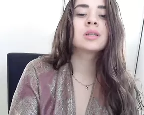 Black chick licks her tits