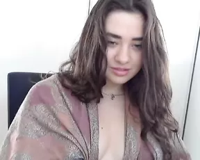 Black chick licks her tits