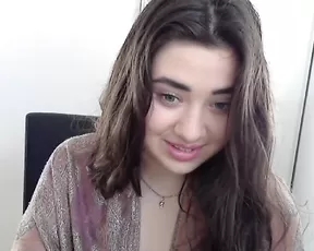 Black chick licks her tits