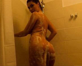 Plump chick is taking a shower