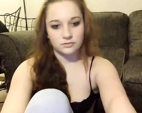 A juicy looking red haired honnie is getting kinky