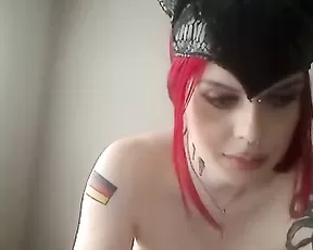 Redhead plays with her dildo