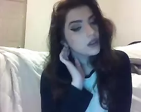 Lovely lady is putting on make up