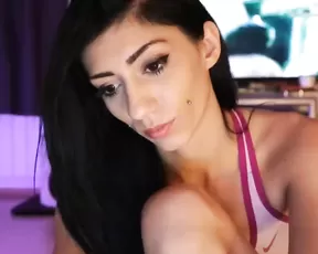 Webcam girl shows her perky boobs