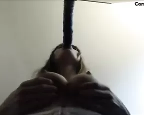 Miss Alice sucking a Dildo