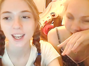 Dark haired babe  with red lips masturbating