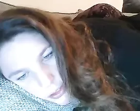 Brunette handles a large dildo