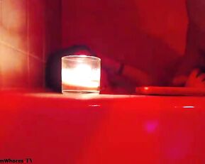 ceceseptember in bathroom with red light