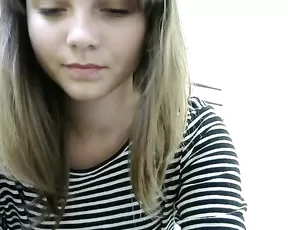 A naked tattooed brunette is sucking cock