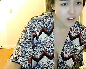 Blonde cutie is caressing her pussy