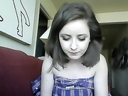 A brunette gets her legs up while masturbating her hole