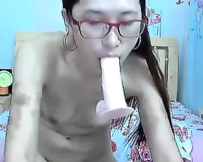 Tall chick is playing with her pussy