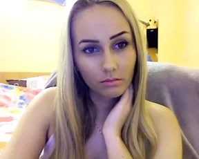 Skinny slut is taking off her top