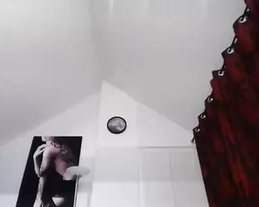 Teeny nurse in front of the webcam
