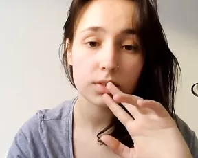 Dreamy looking blonde sucking up cum