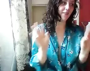 A blonde with large tits licks dick