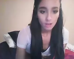 A silver haired teen gets naked and poses on cam