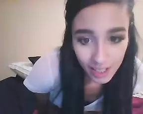 A silver haired teen gets naked and poses on cam
