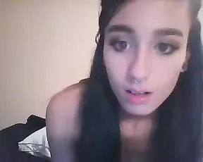 A silver haired teen gets naked and poses on cam