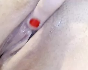 Chick is massaging her wet cunt
