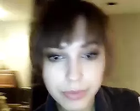 Teen pushes a dildo in herself