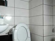 Brunette is pulling a hard cock