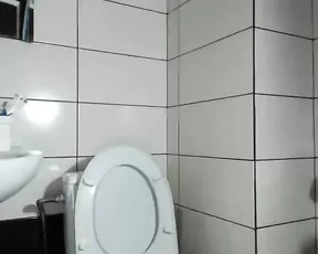 Brunette is pulling a hard cock