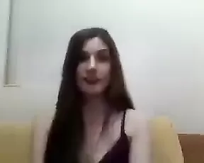 Busty lady is massaging her clit