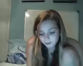 Brunette is massaging her sexy pussy