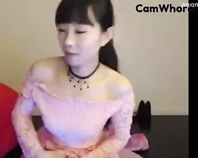 Cute blonde on her knees getting cum on her chest