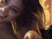 Wavy haired blonde stripping and masturbating